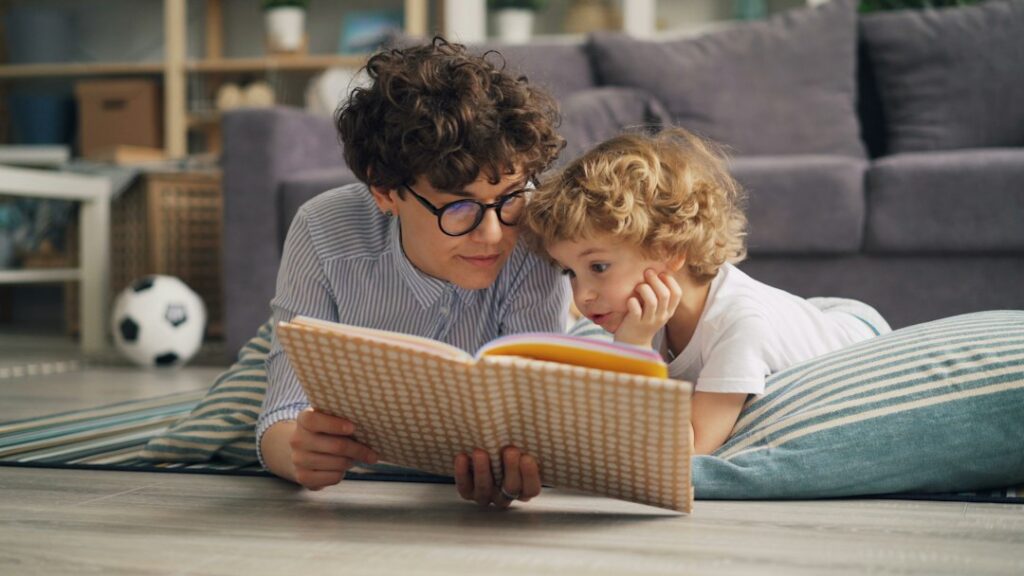 Parent and child reading a book together at home, illustrating how stories can teach values naturally