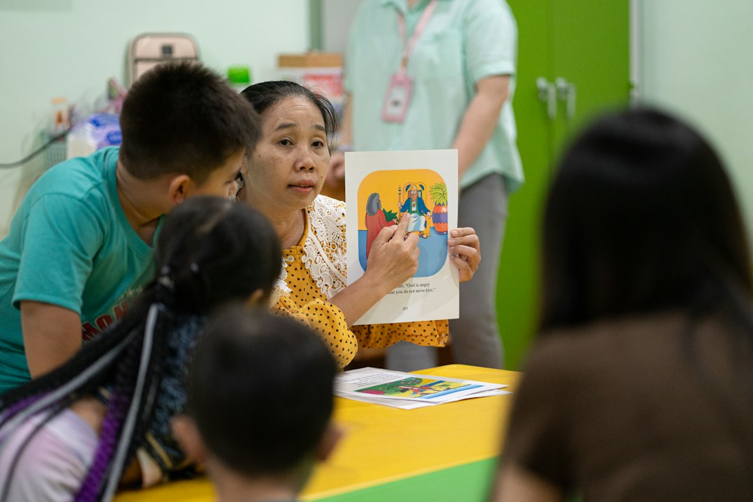 Children reading together and discussing moral stories and life lessons