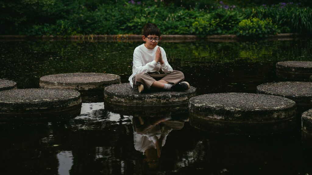 Young person taking a quiet moment to reflect on choices and values