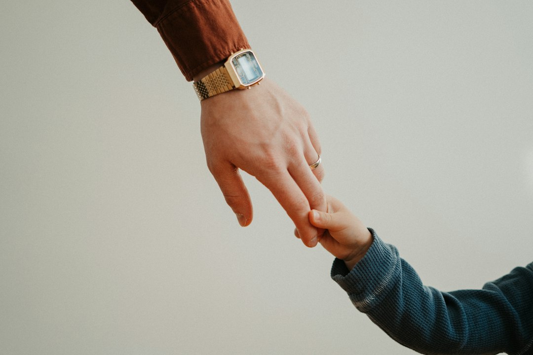 Parent and child together, representing honesty, trust and supportive communication