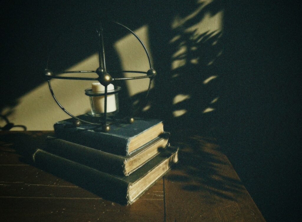 Stack of short books on a wooden table, illustrating brief moral storytelling